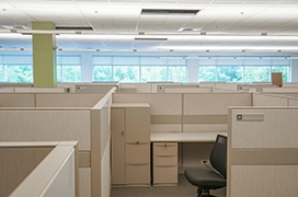 Empy cubicles in an office building.