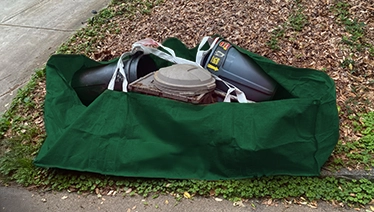 Green dumpster bag.