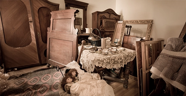 Photo of a vintage bedroom with broken furniture.
