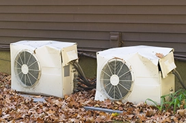 Two broken air conditioners.