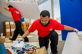 Junk King professionals cleaning out a commercial property.