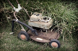 Image of an old lawnmower.