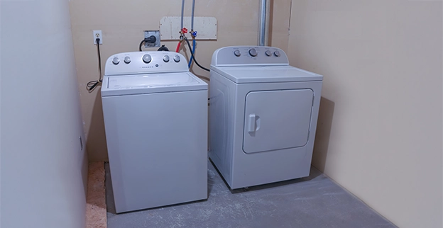 A white washer and dryer.