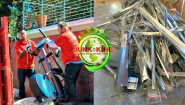 Junk King employees removing junk.