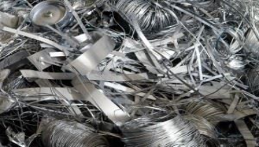 A close-up of a pile of silver metal scrap.