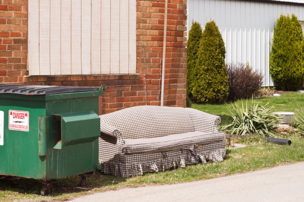 dumpster and couch