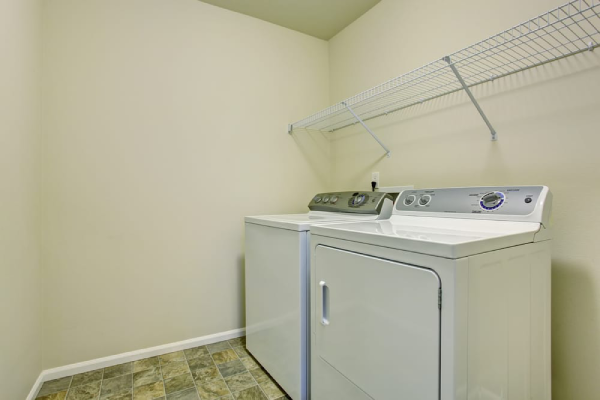 A laundry room featuring a washer and dryer.
