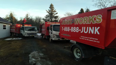 Junk king trucks parked.